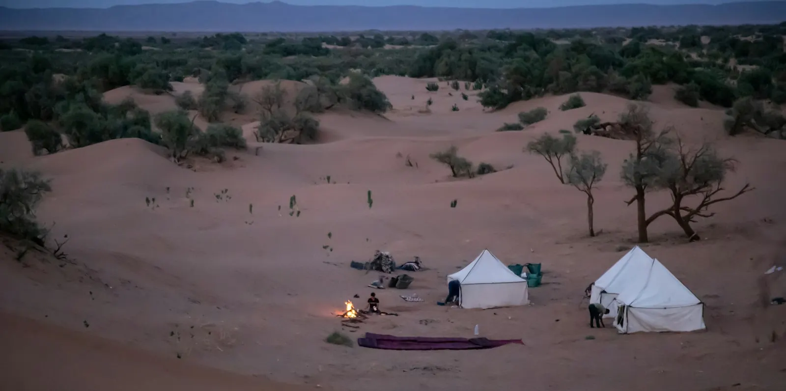 Nomadic life in the Moroccan desert Remote desert camp among sweeping Sahara dunes